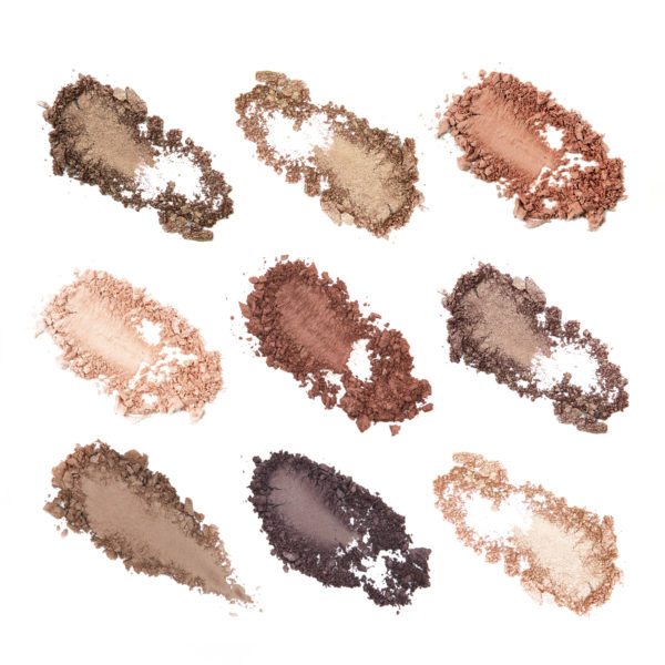 Smears Of Different Decorative Cosmetics On A White Background Isolated